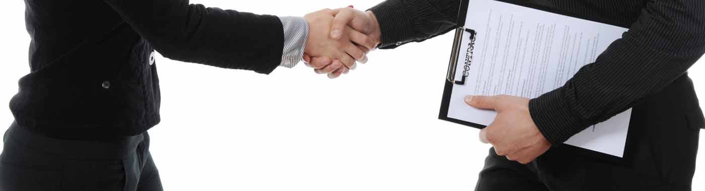 Woman and man shaking hands after signing a contract with Career Employment Service